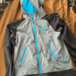 The North Face mens Rain jacket. Size M Gray & black arms & hem, turquoise trim
